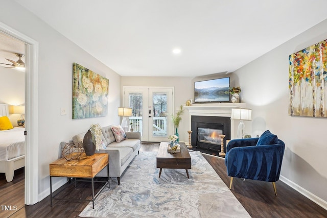 living room featuring hardwood / wood-style floors and french doors