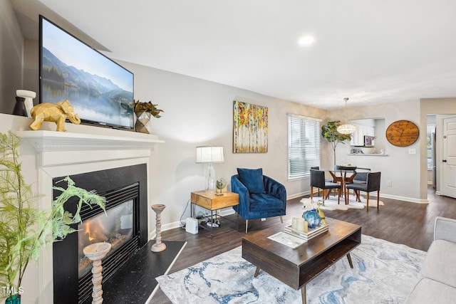 living room featuring dark wood-type flooring