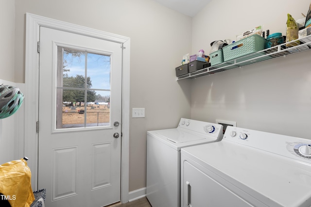 laundry room with washing machine and dryer