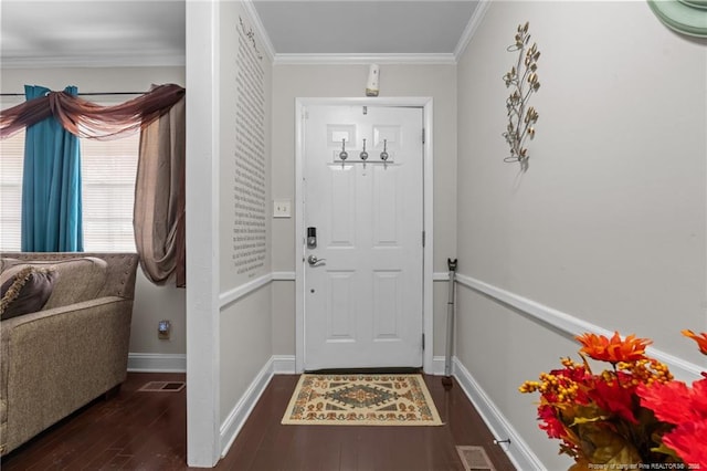 foyer with crown molding and dark hardwood / wood-style floors