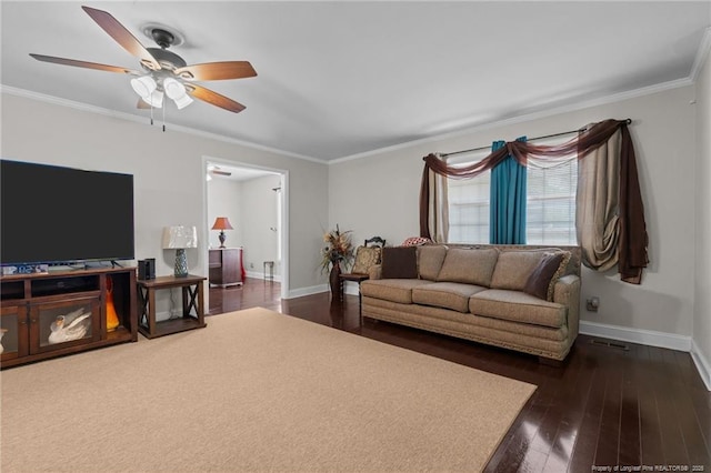 living room featuring crown molding, ceiling fan, and dark wood-type flooring