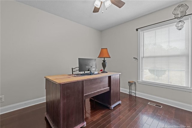 office area featuring dark wood-type flooring and ceiling fan