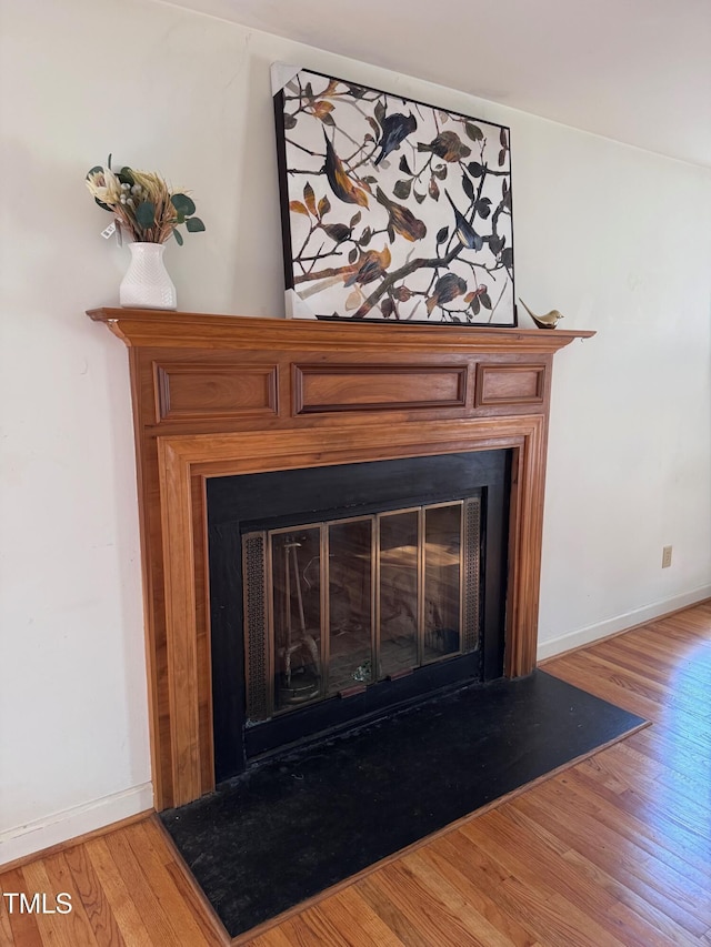 interior details with hardwood / wood-style floors