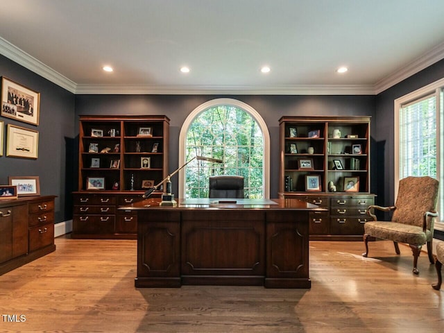 office with ornamental molding, recessed lighting, and light wood-style floors