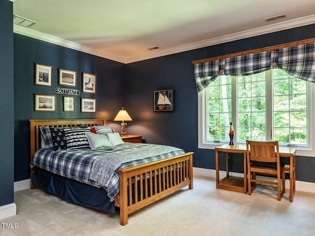 carpeted bedroom with ornamental molding, visible vents, and baseboards