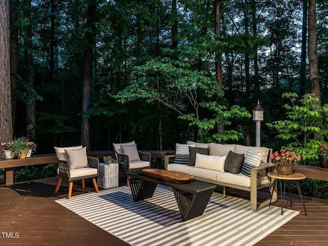 wooden terrace featuring an outdoor hangout area