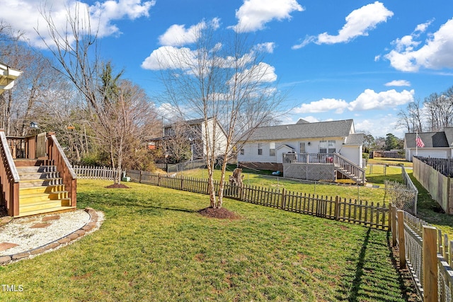 view of yard featuring a wooden deck