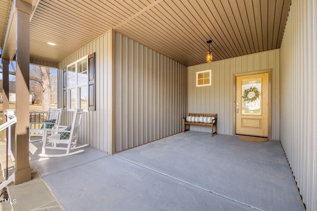 exterior space featuring covered porch and visible vents