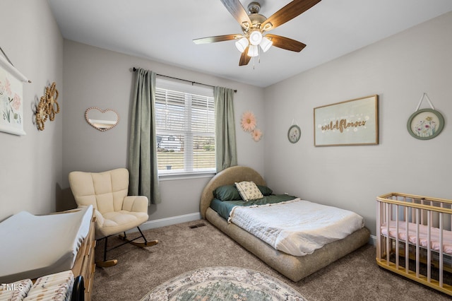 bedroom with carpet, visible vents, ceiling fan, and baseboards