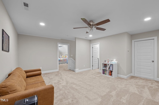 sitting room featuring carpet, visible vents, baseboards, and recessed lighting