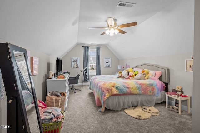 carpeted bedroom featuring lofted ceiling, baseboards, visible vents, and a ceiling fan