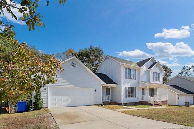 view of front of property with a garage and a front lawn