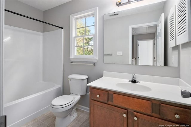 full bathroom featuring tile patterned flooring, vanity, bathtub / shower combination, and toilet