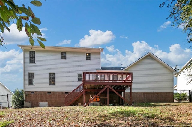 rear view of house with a deck