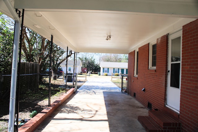 view of patio / terrace featuring fence