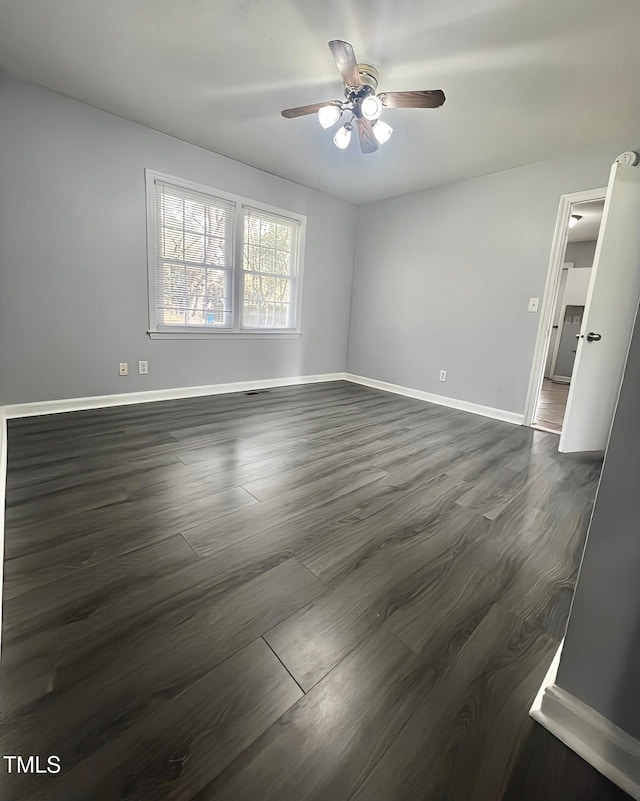 207 Faison Ave, Fayetteville, NC 28304 - empty room featuring dark wood finished floors, baseboards, and ceiling fan