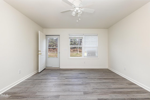 unfurnished room featuring wood-type flooring and ceiling fan