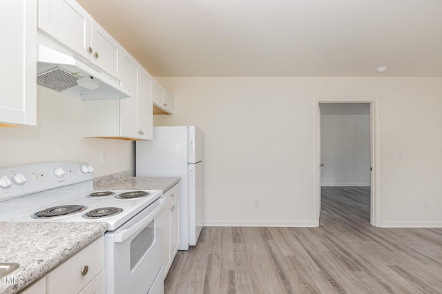 kitchen featuring white appliances, white cabinets, and light wood-type flooring