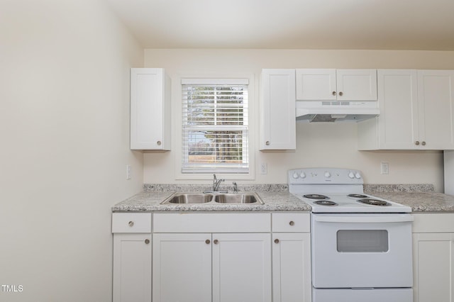 kitchen featuring white cabinets, sink, and electric range