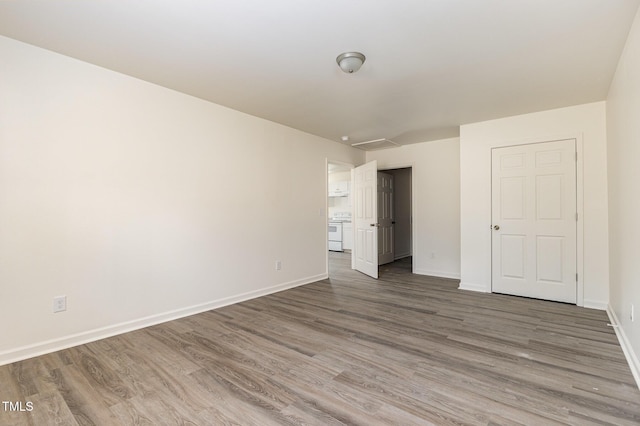 unfurnished bedroom featuring hardwood / wood-style floors