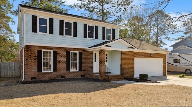 view of front of property featuring a garage