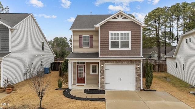 view of front of property with a garage