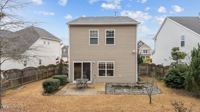 back of house featuring a patio area