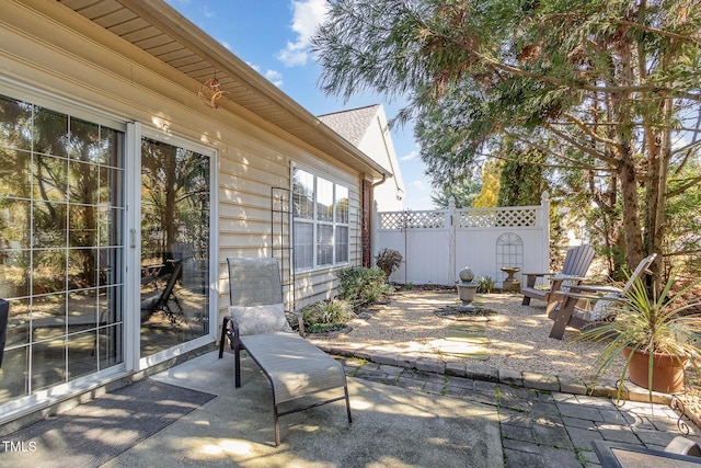 view of patio featuring fence