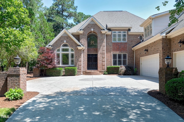 front of property featuring a garage