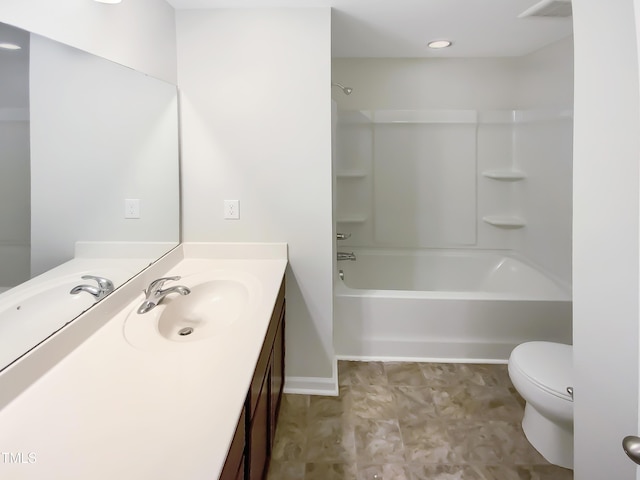 full bathroom featuring vanity, shower / bathtub combination, and toilet