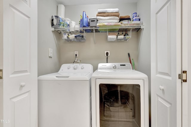 washroom with separate washer and dryer