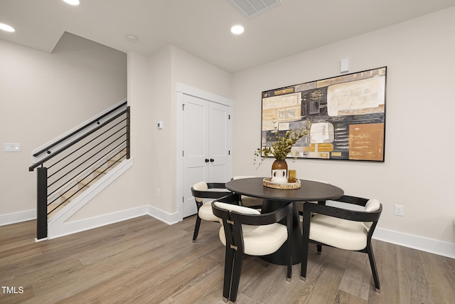 dining area featuring hardwood / wood-style floors