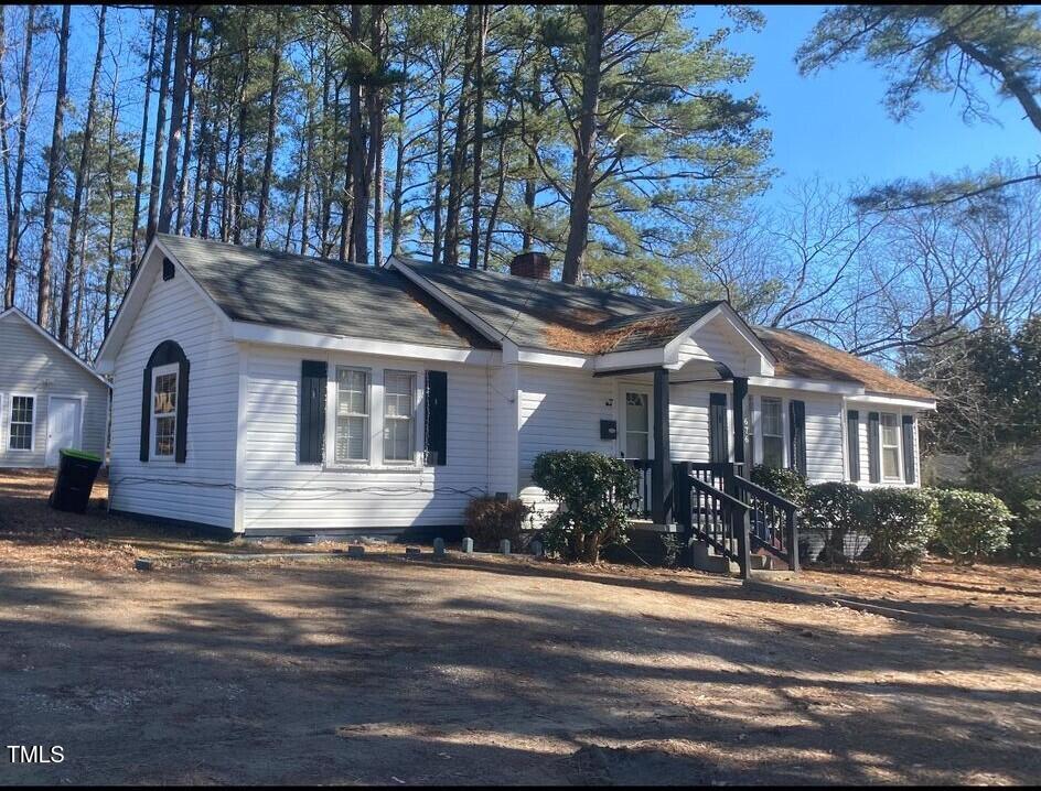 view of front of property with a chimney