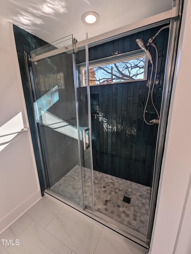 interior space featuring an enclosed shower