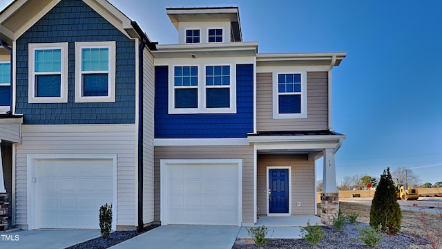 view of front of property with a garage