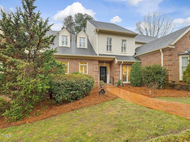 view of front of house with a front lawn