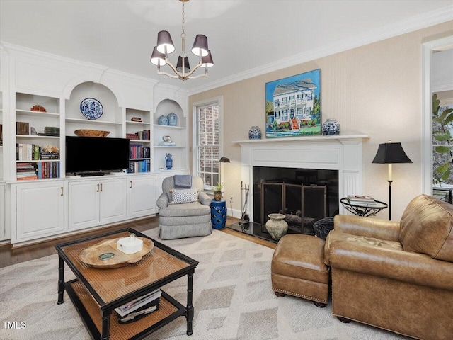 living room with crown molding, an inviting chandelier, and light wood-type flooring