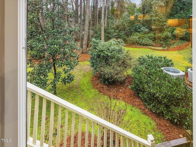 view of yard featuring a balcony