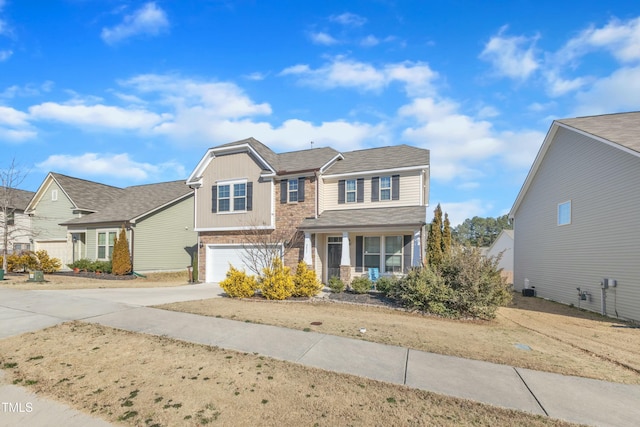 view of front of home featuring a garage and concrete driveway