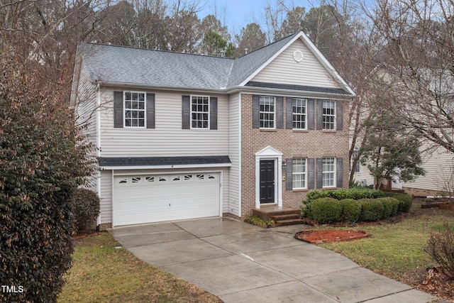 view of front of property with a garage