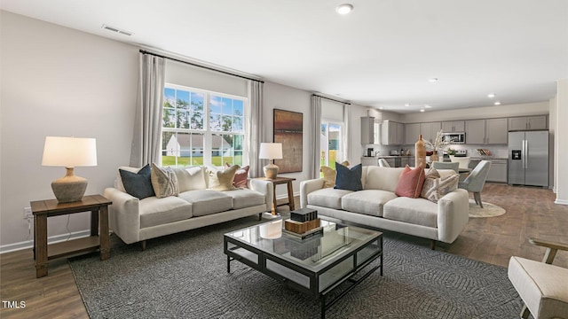 living room featuring dark hardwood / wood-style flooring