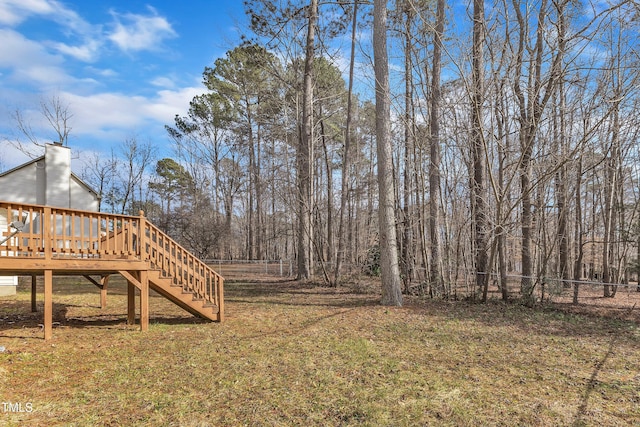 view of yard with a deck