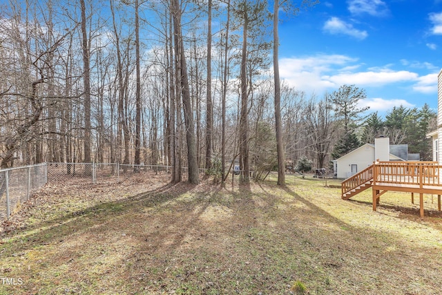 view of yard featuring a wooden deck