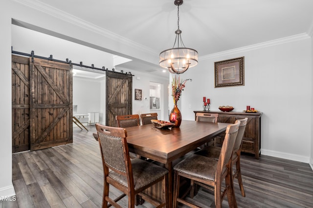 dining area featuring a barn door, a chandelier, crown molding, and dark hardwood / wood-style floors