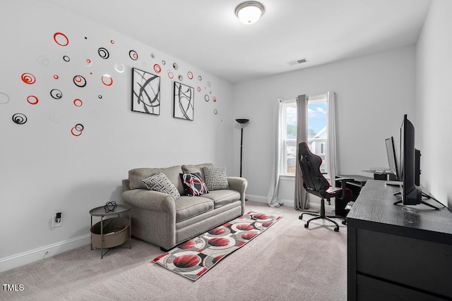office space with light colored carpet