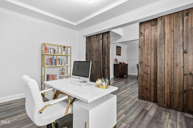 office with ornamental molding and dark hardwood / wood-style flooring