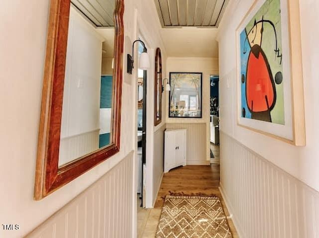 hallway featuring crown molding