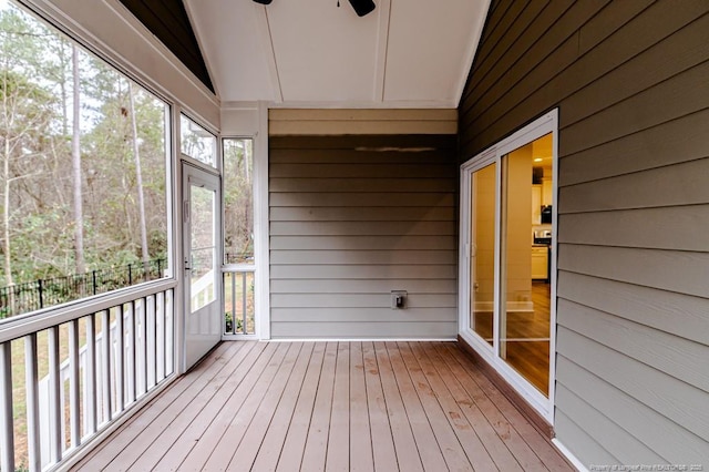 deck featuring vaulted ceiling and ceiling fan