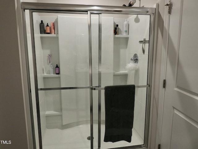 bathroom featuring an enclosed shower