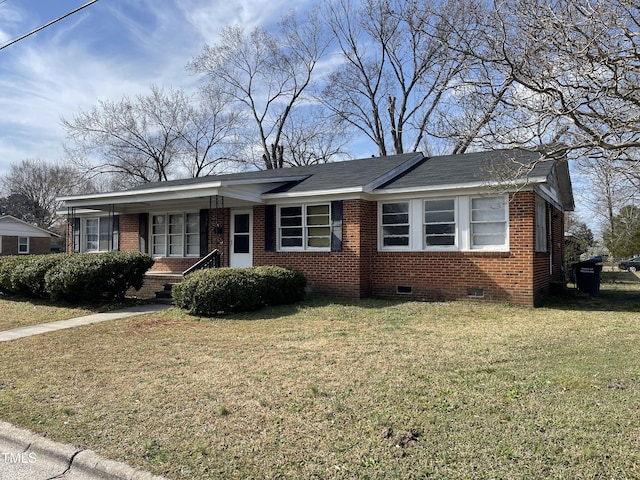 single story home featuring a front lawn